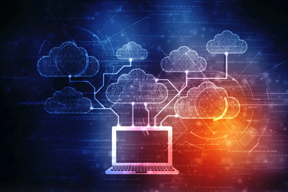 graphic of a laptop with clouds coming out of it